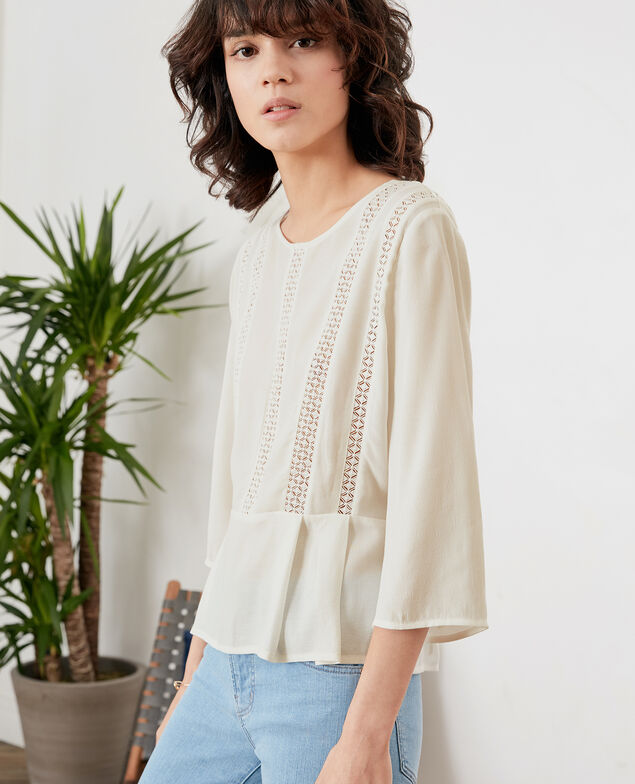 Blusa con péplum y encaje Off white