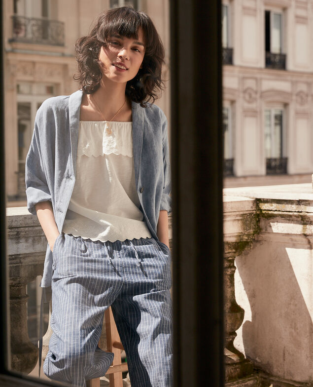 Top con volante elástico y bordado Off white