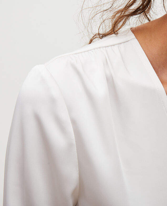 Top de manga larga y cuello de pico Jet stream
